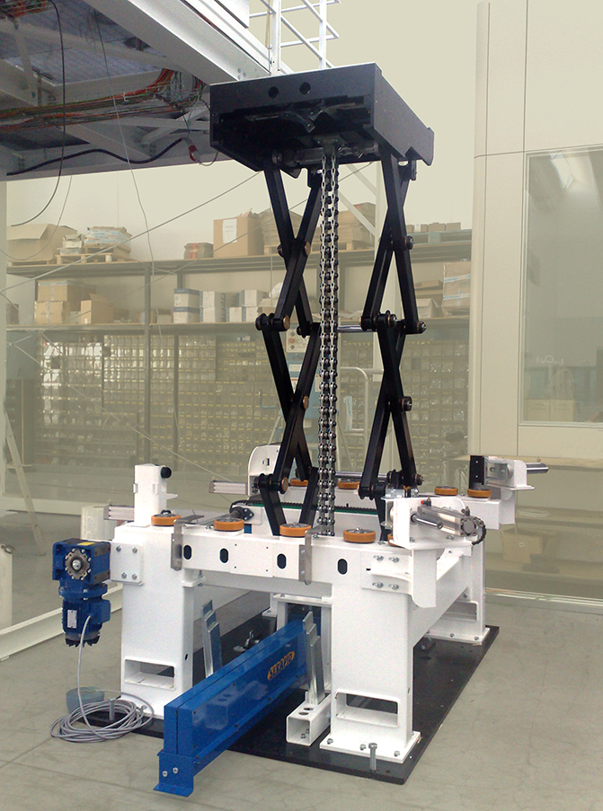 This is a custom loading-station scissor lift that uses a SERAPID 40 chain actuator. Retractable to table-top level, the platform can smoothly lift a heavy load more than 10 ft. A space-saving chain storage magazine fits compactly at the bottom.